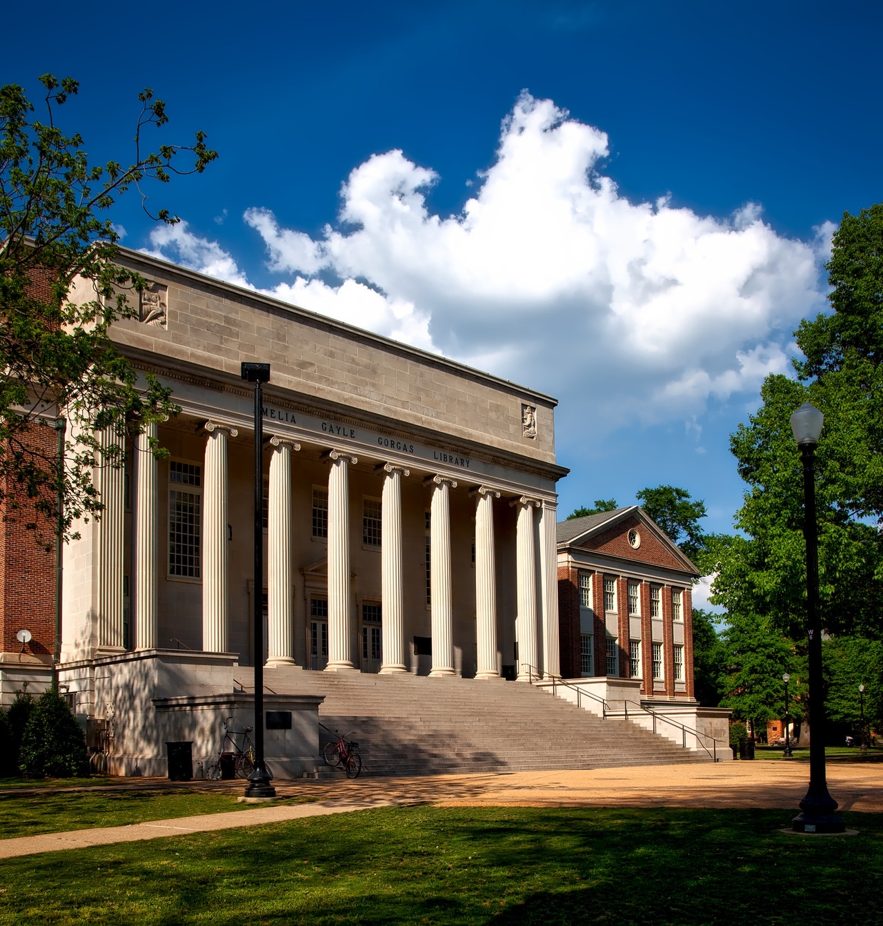 The front/side view of a courthouse on a bright afternoon.